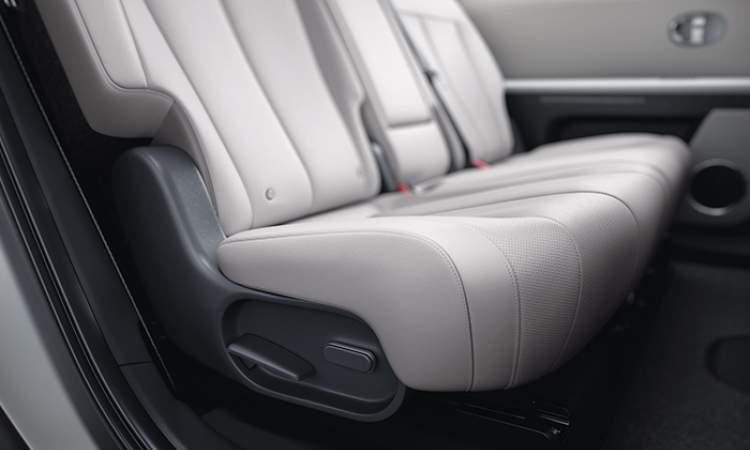 Power sliding rear seats with manual reclining