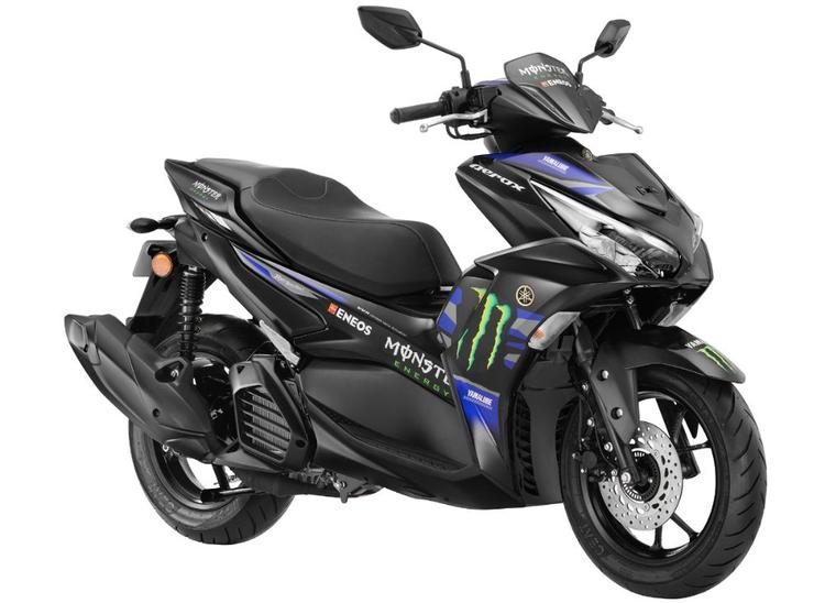 Yamaha Aerox 155 MotoGP Edition Launched; Priced At Rs 1.48 lakh मोटोजीपी एडिशन में यामाहा मोटर रेसिंग टीम की डिजाइन से प्रेरित एक बिल्कुल नई पेंट योजना है. एरोक्स 155 के इस वैरिएंट में मोटोजीपी-थीम वाला पेंट इसकी पूरी बॉडी पर मॉन्स्टर एनर्जी लोगो को दर्शाता है.