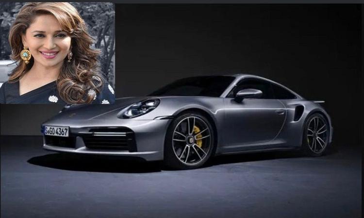 Madhuri Dixit Brings Home New Porsche 911 Turbo S Supercar, Price At Rs. 3.8 Crore 
पोर्श 911 टर्बो एस कंपनी की सबसे महंगी सुपरकार्स में से एक है जो 2.6 सेकंड में 0-100 किमी प्रति घंटे की रफ्तार पकड़ने में सक्षम है और इसकी टॉप स्पीड 330 किमी प्रति घंटा है.