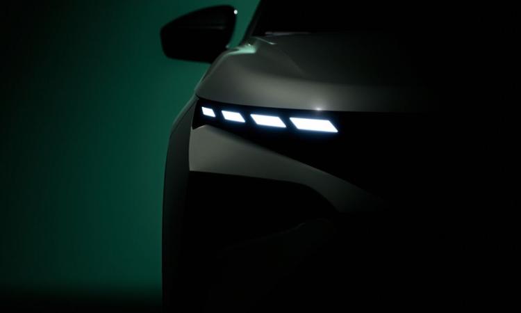 Skoda Elroq Electric SUV To Debut On October 1 नया टीज़र हमें एलरोक के डिज़ाइन की एक झलक देता है, जो फोक्सवैगन समूह के MEB प्लेटफॉर्म पर आधारित होगा.