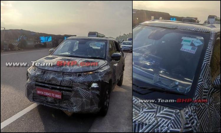 Facelifted Tata Punch CNG Spied Testing Ahead Of Debut पंच फेसलिफ्ट की पिछली स्पाईशॉट्स की तुलना में, यहां सीएनजी कार में कुछ अतिरिक्त फीचर्स की कमी दिख रही है.