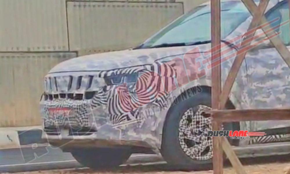 Mahindra XUV700 Facelift To Feature New Headlights, Latest Spy Shots Reveal डिज़ाइन से अलग, बदलाव XUV 700 को 'XUV 7XO' नाम से री-बैज किए जाने की उम्मीद है और संभवतः इसमें महिंद्रा की XEV 9e पर देखे गए ट्रिपल-स्क्रीन लेआउट को अपनाया जाएगा.