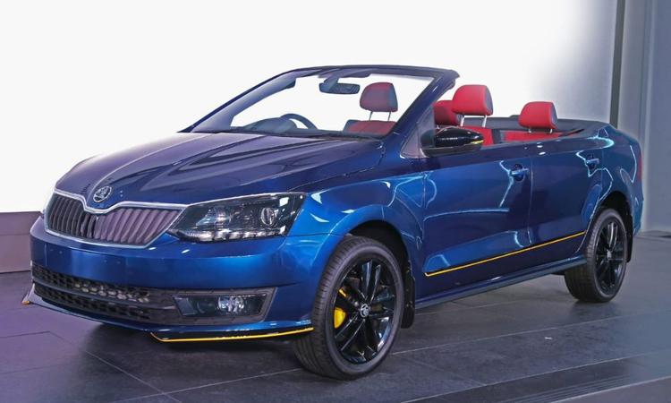 Skoda Rapid Cabriolet Is The VW Group's First Made-In-India 'Student Car' रैपिड कैब्रियोले, छत की कमी के अलावा भी कई बदलाव प्राप्त करती है. रैपिड कैब्रियोले को स्पोर्टी लुक देने के लिए आगे के बंपर में स्प्लिटर जैसे एक्सटेंशन्स को पीले रंग से हाईलाइट किया गया है.