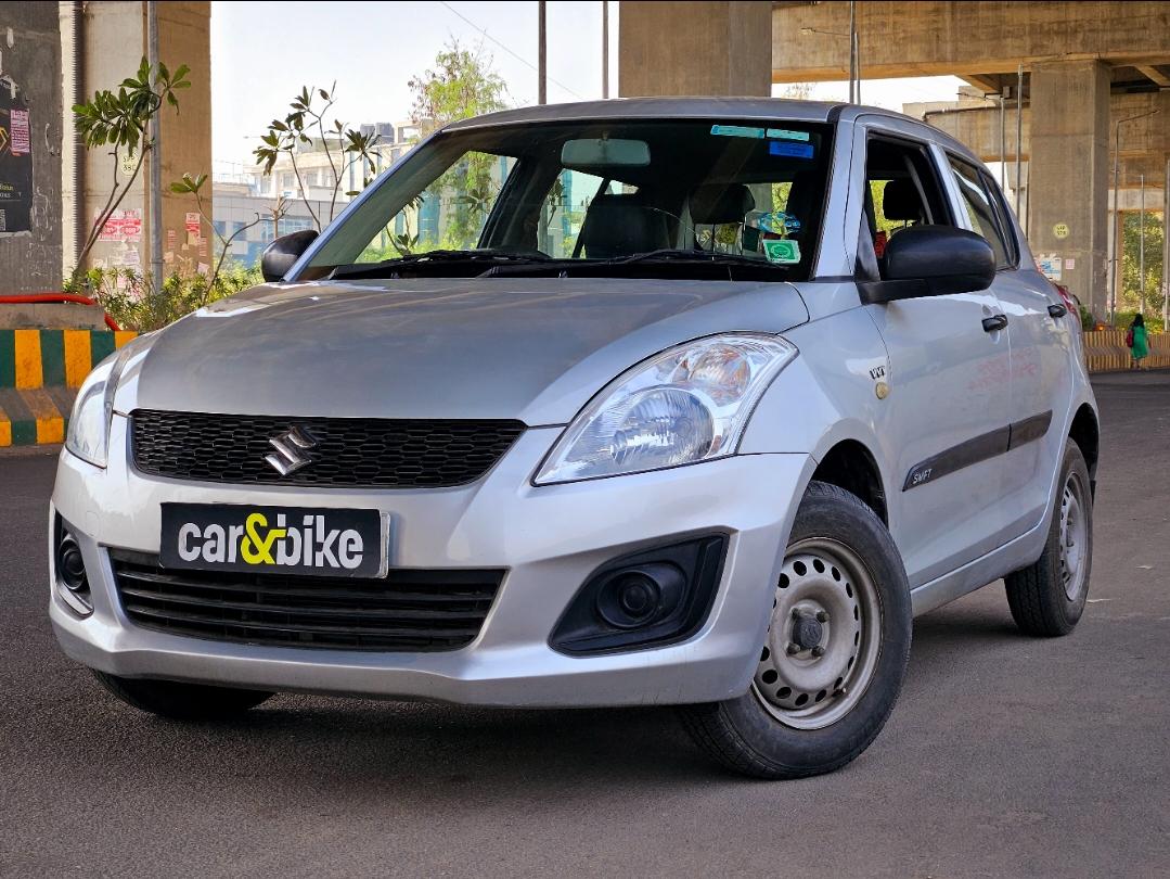 2015 मारुति सुजुकी स्विफ्ट LXI (O) 2015 मारुति सुजुकी स्विफ्ट LXI (O)