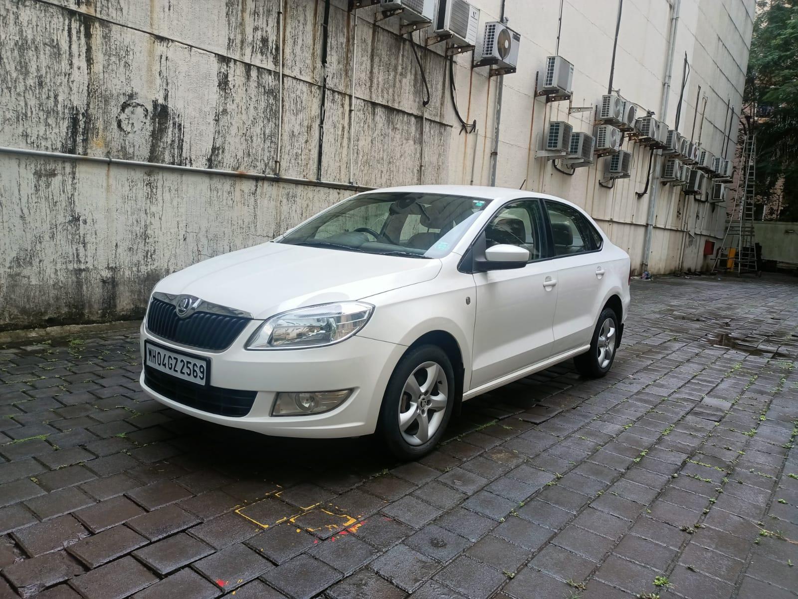 2015 स्कोडा रैपिड 1.5 TDI CR Ambition AT BS IV 2015 स्कोडा रैपिड 1.5 TDI CR Ambition AT BS IV